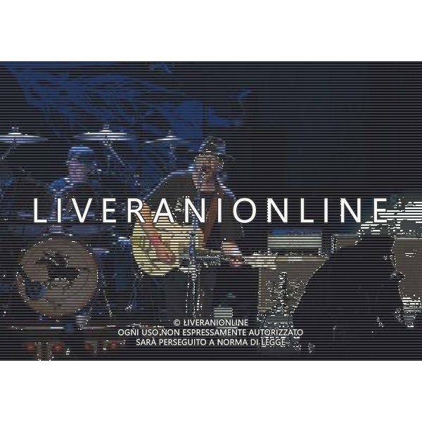 Neil Young and Crazy Horse performing at Liverpool Echo Arena, England on 13th July 2014. Drummer Ralf Molina; lead singer/guitarist Neil Young; ©PHOTOSHOT/Agenzia Aldo Liverani sas - ITALY ONLY - EDITORIAL USE ONLY