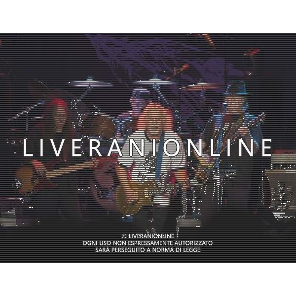 Neil Young and Crazy Horse performing at Liverpool Echo Arena, England on 13th July 2014. Bassist Rick Rosas; drummer Ralf Molina; Guitarist Frank Sampedro; lead singer/guitarist Neil Young. ©PHOTOSHOT/Agenzia Aldo Liverani sas - ITALY ONLY - EDITORIAL USE ONLY