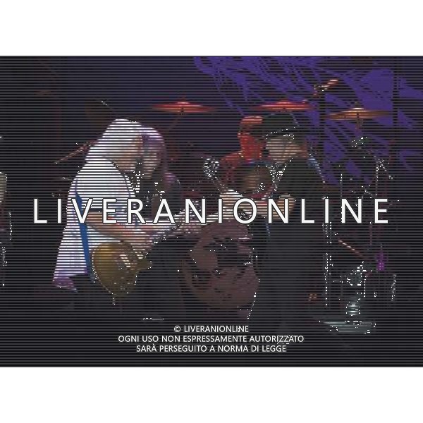 Neil Young and Crazy Horse performing at Liverpool Echo Arena, England on 13th July 2014. Guitarist Frank Sampedro; Bassist Rick Rosas; drummer Ralf Molina; lead singer/guitarist Neil Young. ©PHOTOSHOT/Agenzia Aldo Liverani sas - ITALY ONLY - EDITORIAL USE ONLY