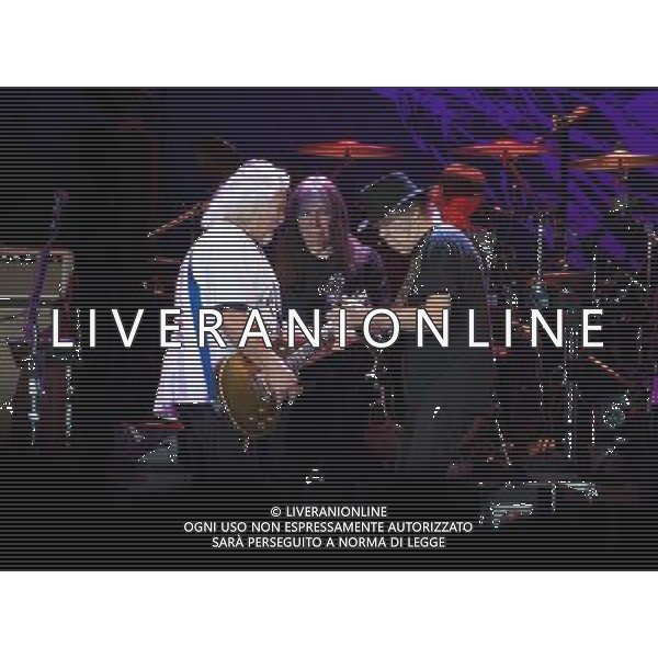 Neil Young and Crazy Horse performing at Liverpool Echo Arena, England on 13th July 2014. Guitarist Frank Sampedro; Bassist Rick Rosas; lead singer/guitarist Neil Young; drummer Ralf Molina. ©PHOTOSHOT/Agenzia Aldo Liverani sas - ITALY ONLY - EDITORIAL USE ONLY