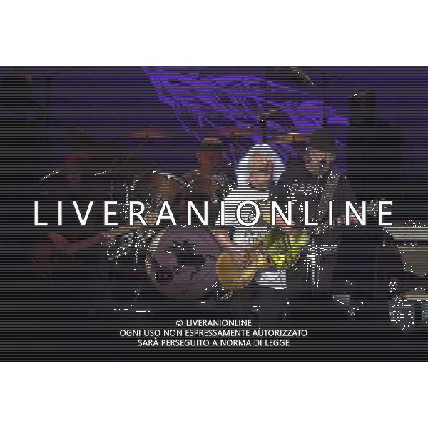 Neil Young and Crazy Horse performing at Liverpool Echo Arena, England on 13th July 2014. Bassist Rick Rosas; drummer Ralf Molina; Guitarist Frank Sampedro; lead singer/guitarist Neil Young. ©PHOTOSHOT/Agenzia Aldo Liverani sas - ITALY ONLY - EDITORIAL USE ONLY