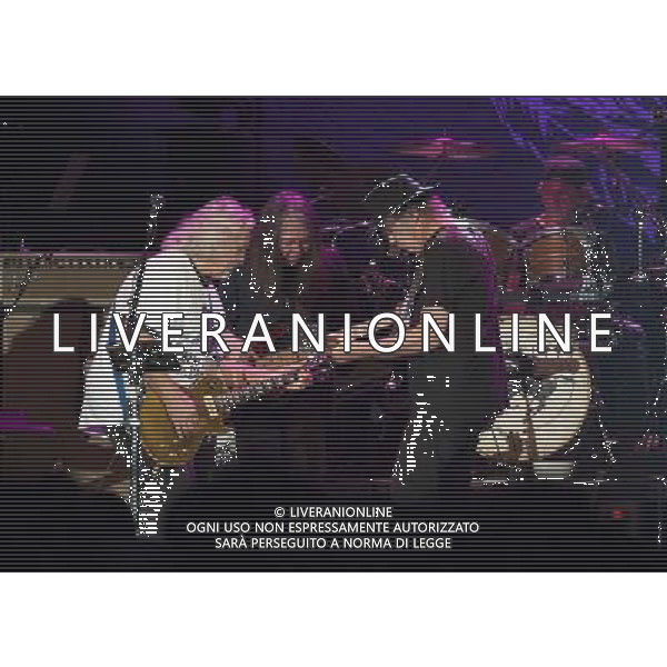 Neil Young and Crazy Horse performing at Liverpool Echo Arena, England on 13th July 2014. Guitarist Frank Sampedro; Bassist Rick Rosas; lead singer/guitarist Neil Young; drummer Ralf Molina. ©PHOTOSHOT/Agenzia Aldo Liverani sas - ITALY ONLY - EDITORIAL USE ONLY
