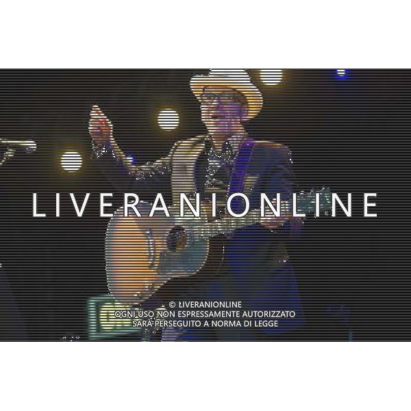 English singer-songwriter Elvis Costello performs at Kew Gardens, Richmond, Greater London, England, UK on Wednesday 16th July 2014 as part of the Kew The Music Series of concerts. Costello lived locally in Twickenham and the gig is billed as a homecoming gig. ©PHOTOSHOT/Agenzia Aldo Liverani sas - ITALY ONLY - EDITORIAL USE ONLY