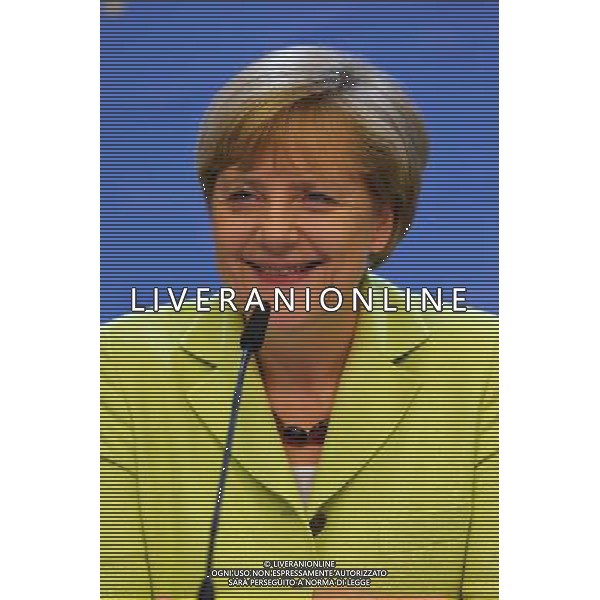 (140717) -- BRUSSELS, July 17, 2014 () -- German Chancellor Angela Merkel smiles as she receives birthday wishes at a press conference after a special meeting of the European Council at the EU headquarters in Brussels, capital of Belgium, July 17, 2014, on the occasion of Merkel\'s 60th birthday. (/Gong Bing) ©PHOTOSHOT/Agenzia Aldo Liverani sas - ITALY ONLY - EDITORIAL USE ONLY - Riunione straordinaria del Consiglio europeo presso la sede dell\'Unione europea a Bruxelles, capitale del Belgio 17 luglio 2014
