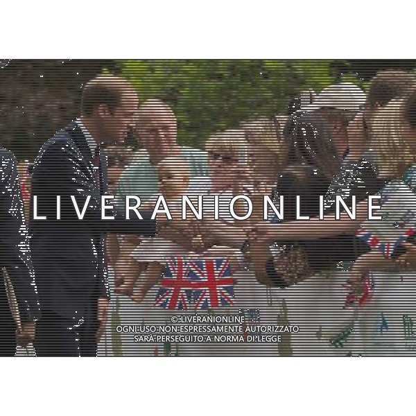 COVENTRY, ENGLAND - JULY 16: Prince William, Duke of Cambridge greets the crowd during an official visit to the Coventry War Memorial Park on July 16, 2014 in Coventry, England. The Duke made the visit to mark the Centenary of the First World War. () ©photoshot/Agenzia Aldo Liverani sas - ITALY ONLY - EDITORIAL USE ONLY - REALI INGLESI: Il Principe William, in visita al War Memorial Park, Coventry, il Parco dedicato al sacrificio di coloro che hanno perso la vita nella Grande Guerra, inghilterra 17 luglio 2014