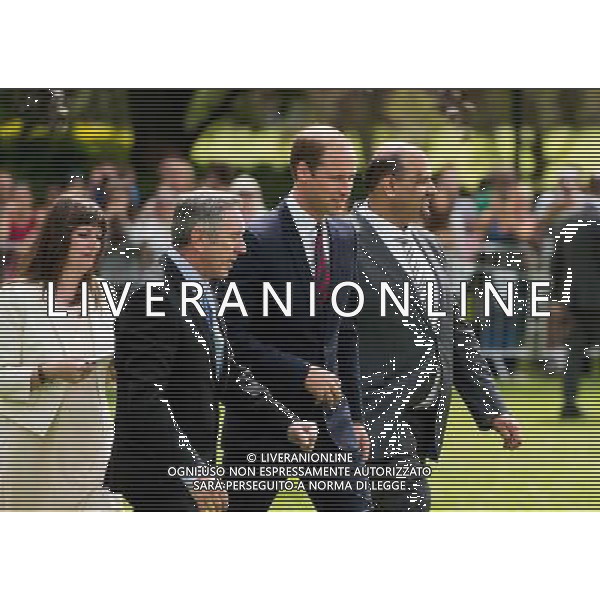 COVENTRY, ENGLAND - JULY 16: Prince William, Duke of Cambridge walk onto the sports field during an official visit to the Coventry War Memorial Park on July 16, 2014 in Coventry, England. The Duke made the visit to mark the Centenary of the First World War. () ©photoshot/Agenzia Aldo Liverani sas - ITALY ONLY - EDITORIAL USE ONLY - REALI INGLESI: Il Principe William, in visita al War Memorial Park, Coventry, il Parco dedicato al sacrificio di coloro che hanno perso la vita nella Grande Guerra, inghilterra 17 luglio 2014