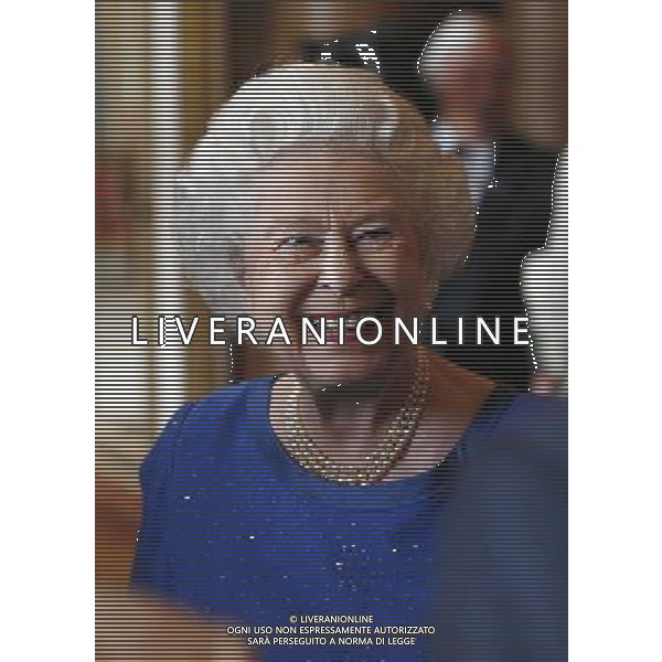 Queen Elizabeth II greets guests at a reception at Buckingham Palace for winners of The Queen\'s Awards for Enterprise 2014. Monday July 14, 2014. ©photoshot/Agenzia Aldo Liverani sas - ITALY ONLY - EDITORIAL USE ONLY - REALI INGLESI: La Regina Elisabetta II accoglie gli ospiti in un ricevimento a Buckingham Palace per i vincitori della Regina Awards for Enterprise 2014 Londra 14 luglio 2014