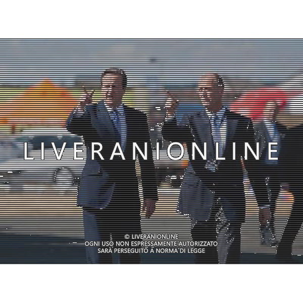 David Cameron, the Prime Minister and Tom Enders the CEO of Airbus Group walk towards an A350 at Farnborough International Airshow, Hampshire. July 11th, 2014 ©photoshot/Agenzia Aldo Liverani sas - ITALY ONLY - EDITORIAL USE ONLY - David Cameron, il primo ministro al Farnborough International Airshow, Hampshire. 11 Luglio 2014