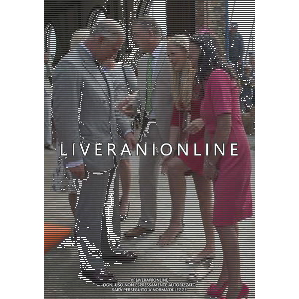 THE CAMEL TOE TATTOO ON THE FOOT OF TORI NAISMITH IN MEMORY OF HER DEAD BROTHER OLLIE NAISMITH THAT SHE PROUDLY SHOWED THE THE PRINCE OF WALES DURING HIS VISIT TO LOOE, CORNWALL PICTURE ©photoshot/Agenzia Aldo Liverani sas - ITALY ONLY - EDITORIAL USE ONLY - REALI INGLESI: Il Principe Carlo d\'inghilterra con la moglie Camilla duchessa di Cornovaglia, ha visitato il mercato di via Looe