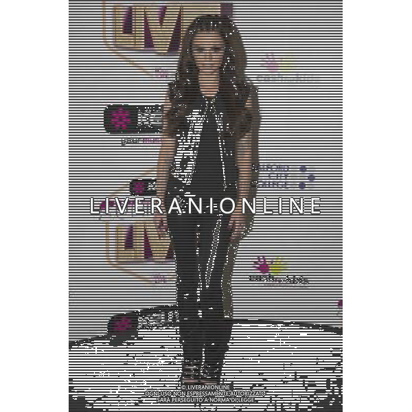 Cher Lloyd poses backstage at Key 103 Live at Manchester Arena, Manchester, England, 17th July 2014. ©photoshot/Agenzia Aldo Liverani sas - ITALY ONLY - EDITORIAL USE ONLY