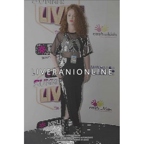 Singer Jess Glynne poses backstage at Key 103 Live at Manchester Arena, Manchester, England, 17th July 2014. ©photoshot/Agenzia Aldo Liverani sas - ITALY ONLY - EDITORIAL USE ONLY