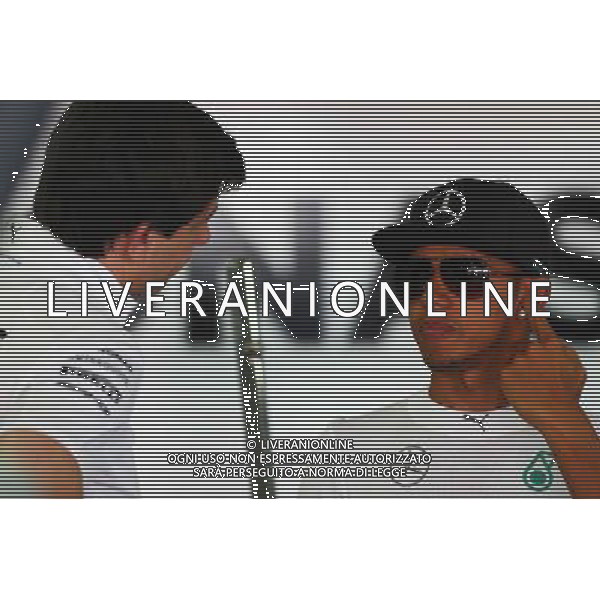 (L to R): Toto Wolff (GER) Mercedes AMG F1 Shareholder and Executive Director wio Lewis Hamilton (GBR) Mercedes AMG F1. 18.07.2014. Formula 1 World Championship, Rd 10, German Grand Prix, Hockenheim, Germany, Practice Day. - www.xpbimages.com, EMail: requests@xpbimages.com - copy of publication required for printed pictures. Every used picture is fee-liable. © Copyright: Batchelor / XPB Images /Agenzia Aldo Liverani sas - ONLY ITALY - Formula 1 Gran Premio di Germania 2014 Hockenheim - Prove libere