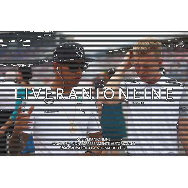 (L to R): Lewis Hamilton (GBR) Mercedes AMG F1 with Kevin Magnussen (DEN) McLaren on the drivers parade. 20.07.2014. Formula 1 World Championship, Rd 10, German Grand Prix, Hockenheim, Germany, Race Day. - www.xpbimages.com, EMail: requests@xpbimages.com - copy of publication required for printed pictures. Every used picture is fee-liable. © Copyright: Schaber / XPB Images /AGENZIA ALDO LIVERANI SAS - ITALY ONLY - EDITORIAL USE ONLY - Gp F1 germania Gara