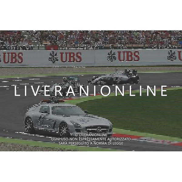 Nico Rosberg (GER) Mercedes AMG F1 W05 leads behind the FIA Safety Car. 20.07.2014. Formula 1 World Championship, Rd 10, German Grand Prix, Hockenheim, Germany, Race Day. - www.xpbimages.com, EMail: requests@xpbimages.com - copy of publication required for printed pictures. Every used picture is fee-liable. © Copyright: Photo4 / XPB Images /AGENZIA ALDO LIVERANI SAS - ITALY ONLY - EDITORIAL USE ONLY - Gp F1 germania Gara