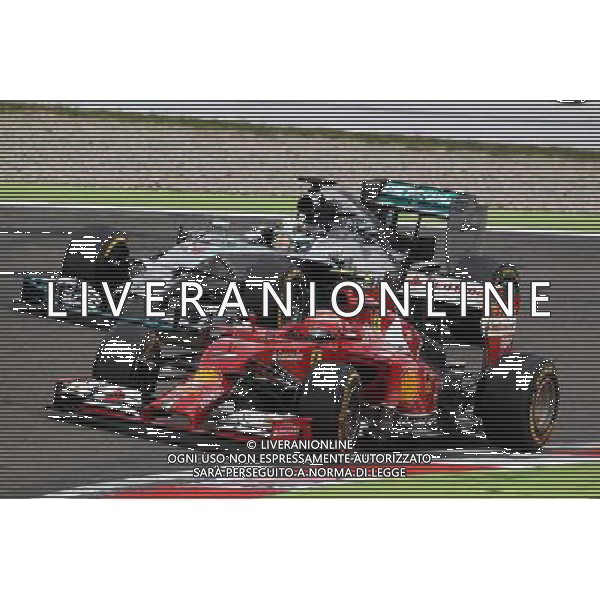 Kimi Raikkonen (FIN) Ferrari F14-T and Lewis Hamilton (GBR) Mercedes AMG F1 W05 battle for position. 20.07.2014. Formula 1 World Championship, Rd 10, German Grand Prix, Hockenheim, Germany, Race Day. - www.xpbimages.com, EMail: requests@xpbimages.com - copy of publication required for printed pictures. Every used picture is fee-liable. © Copyright: Photo4 / XPB Images - Gp F1 Germania gara /AGENZIA ALDO LIVERANI SAS - ITALY ONLY - EDITORIAL USE ONLY