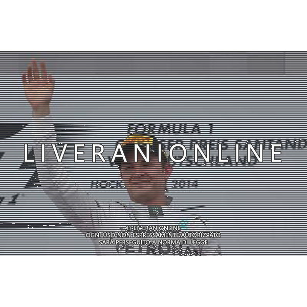 Nico Rosberg (GER), Mercedes AMG F1 Team 20.07.2014. Formula 1 World Championship, Rd 10, German Grand Prix, Hockenheim, Germany, Race Day. - www.xpbimages.com, EMail: requests@xpbimages.com - copy of publication required for printed pictures. Every used picture is fee-liable. © Copyright: Charniaux / XPB Images - Gp F1 Germania gara /AGENZIA ALDO LIVERANI SAS - ITALY ONLY - EDITORIAL USE ONLY