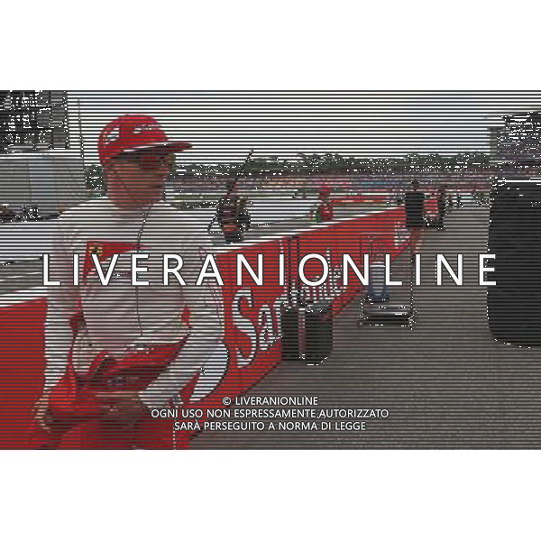 Kimi Raikkonen (FIN) Ferrari on the grid. 20.07.2014. Formula 1 World Championship, Rd 10, German Grand Prix, Hockenheim, Germany, Race Day. - www.xpbimages.com, EMail: requests@xpbimages.com - copy of publication required for printed pictures. Every used picture is fee-liable. © Copyright: Batchelor / XPB Images - Gp F1 Germania gara /AGENZIA ALDO LIVERANI SAS - ITALY ONLY - EDITORIAL USE ONLY