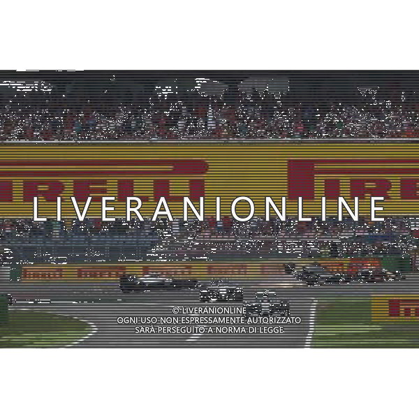 Nico Rosberg (GER) Mercedes AMG F1 W05 leads as Felipe Massa (BRA) Williams FW36 crashes out of the race. 20.07.2014. Formula 1 World Championship, Rd 10, German Grand Prix, Hockenheim, Germany, Race Day. - www.xpbimages.com, EMail: requests@xpbimages.com - copy of publication required for printed pictures. Every used picture is fee-liable. © Copyright: Batchelor / XPB Images - Gp F1 Germania gara /AGENZIA ALDO LIVERANI SAS - ITALY ONLY - EDITORIAL USE ONLY