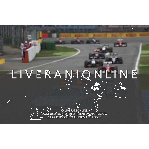 Nico Rosberg (GER) Mercedes AMG F1 W05 leads behind the FIA Safety Car. 20.07.2014. Formula 1 World Championship, Rd 10, German Grand Prix, Hockenheim, Germany, Race Day. - www.xpbimages.com, EMail: requests@xpbimages.com - copy of publication required for printed pictures. Every used picture is fee-liable. © Copyright: Batchelor / XPB Images - Gp F1 Germania gara /AGENZIA ALDO LIVERANI SAS - ITALY ONLY - EDITORIAL USE ONLY