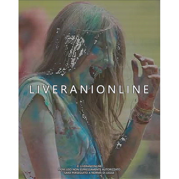 (140719) -- ST. PETERSBURG, July 19, 2014 () -- A girl participates in the Festival of Colors in St. Petersburg, Russia, on July 19, 2014. (/Lu Jinbo) ©photoshot/AGENZIA ALDO LIVERANI SAS - ITALY ONLY - Le persone partecipano al Festival dei colori a San Pietroburgo, in Russia, il 19 luglio 2014