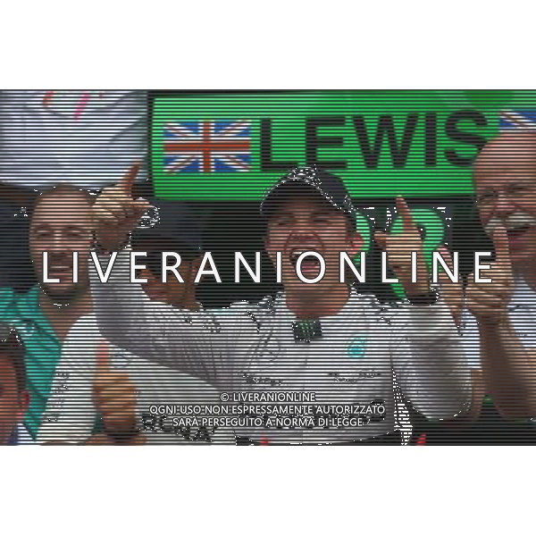 1st place Nico Rosberg (GER) Mercedes AMG F1 W05 and 3rd place Lewis Hamilton (GBR) Mercedes AMG F1 W05. 20.07.2014. Formula 1 World Championship, Rd 10, German Grand Prix, Hockenheim, Germany, Race Day. - www.xpbimages.com, EMail: requests@xpbimages.com - copy of publication required for printed pictures. Every used picture is fee-liable. Â© Copyright: Batchelor / XPB Images /AGENZIA ALDO LIVERANI SAS - ITALY ONLY - EDITORIAL USE ONLY - Gp F1 Germania gara