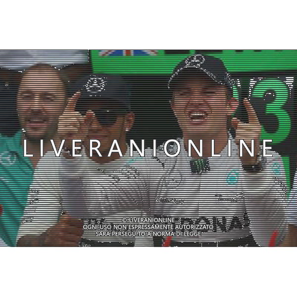 1st place Nico Rosberg (GER) Mercedes AMG F1 W05 and 3rd place Lewis Hamilton (GBR) Mercedes AMG F1 W05. 20.07.2014. Formula 1 World Championship, Rd 10, German Grand Prix, Hockenheim, Germany, Race Day. - www.xpbimages.com, EMail: requests@xpbimages.com - copy of publication required for printed pictures. Every used picture is fee-liable. Â© Copyright: Batchelor / XPB Images /AGENZIA ALDO LIVERANI SAS - ITALY ONLY - EDITORIAL USE ONLY - Gp F1 Germania gara