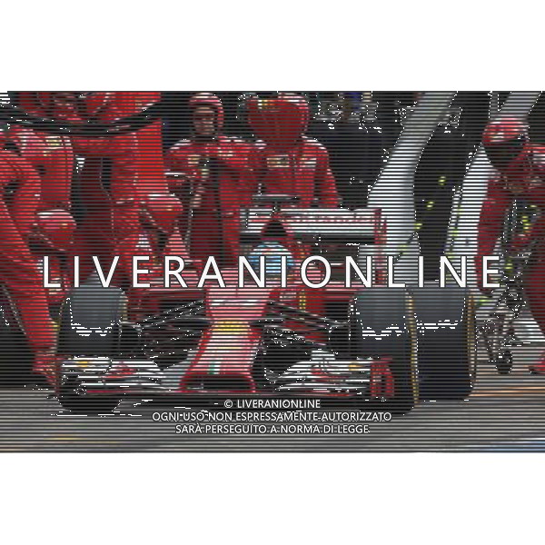 Fernando Alonso (ESP), Scuderia Ferrari during pitstop 20.07.2014. Formula 1 World Championship, Rd 10, German Grand Prix, Hockenheim, Germany, Race Day. - www.xpbimages.com, EMail: requests@xpbimages.com - copy of publication required for printed pictures. Every used picture is fee-liable. Â© Copyright: Charniaux / XPB Images /AGENZIA ALDO LIVERANI SAS - ITALY ONLY - EDITORIAL USE ONLY - Gp F1 Germania gara