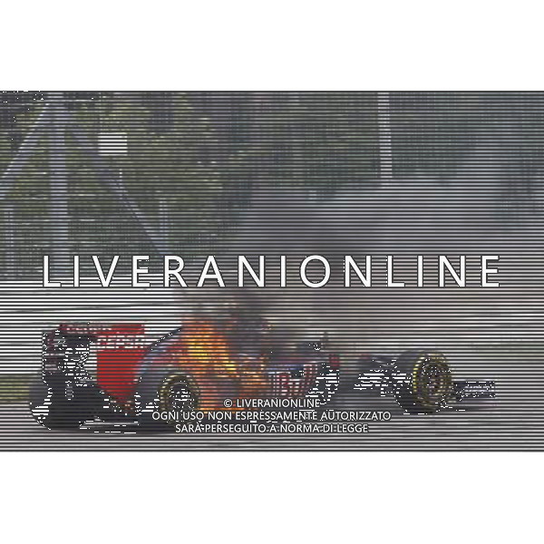 Daniil Kvyat (RUS) Scuderia Toro Rosso STR9 catches fire and retires from the race. 20.07.2014. Formula 1 World Championship, Rd 10, German Grand Prix, Hockenheim, Germany, Race Day. - www.xpbimages.com, EMail: requests@xpbimages.com - copy of publication required for printed pictures. Every used picture is fee-liable. Â© Copyright: Trienitz / XPB Images /AGENZIA ALDO LIVERANI SAS - ITALY ONLY - EDITORIAL USE ONLY - Gp F1 Germania gara