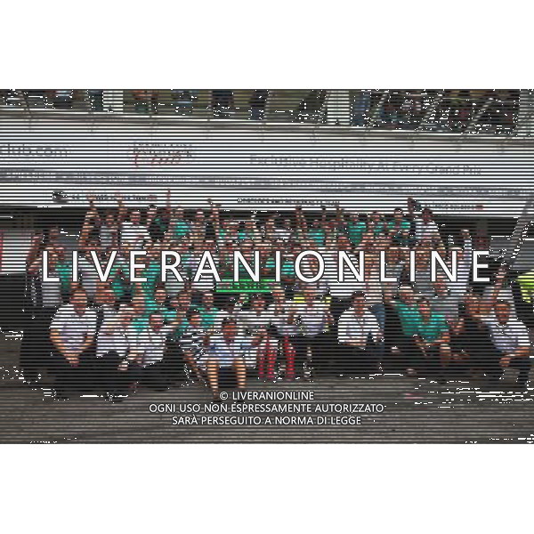 Race winner Nico Rosberg (GER) Mercedes AMG F1 celebrates with the team. 20.07.2014. Formula 1 World Championship, Rd 10, German Grand Prix, Hockenheim, Germany, Race Day. - www.xpbimages.com, EMail: requests@xpbimages.com - copy of publication required for printed pictures. Every used picture is fee-liable. Â© Copyright: Schaber / XPB Images /AGENZIA ALDO LIVERANI SAS - ITALY ONLY - EDITORIAL USE ONLY - Gp F1 Germania gara