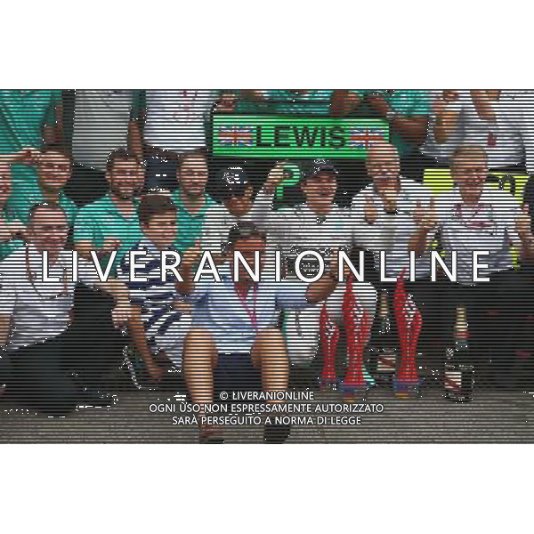 Race winner Nico Rosberg (GER) Mercedes AMG F1 celebrates with the team. 20.07.2014. Formula 1 World Championship, Rd 10, German Grand Prix, Hockenheim, Germany, Race Day. - www.xpbimages.com, EMail: requests@xpbimages.com - copy of publication required for printed pictures. Every used picture is fee-liable. Â© Copyright: Schaber / XPB Images /AGENZIA ALDO LIVERANI SAS - ITALY ONLY - EDITORIAL USE ONLY - Gp F1 Germania gara