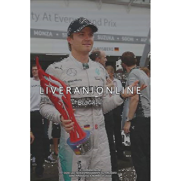 Race winner Nico Rosberg (GER) Mercedes AMG F1 celebrates with the team. 20.07.2014. Formula 1 World Championship, Rd 10, German Grand Prix, Hockenheim, Germany, Race Day. - www.xpbimages.com, EMail: requests@xpbimages.com - copy of publication required for printed pictures. Every used picture is fee-liable. Â© Copyright: Schaber / XPB Images /AGENZIA ALDO LIVERANI SAS - ITALY ONLY - EDITORIAL USE ONLY - Gp F1 Germania gara