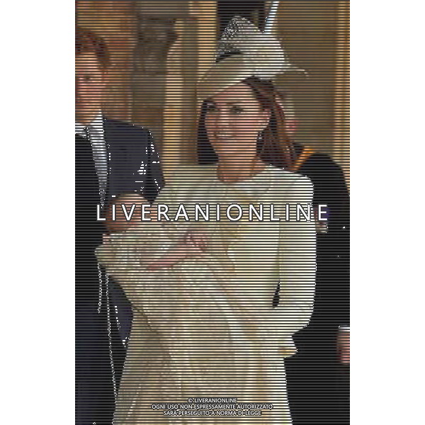 The Duchess of Cambridge carries her son Prince George after his christinening at the Chapel Royal in St James\'s Palace by the Archbishop of Canterbury in central London. ©photoshot/AGENZIA ALDO LIVERANI SAS - ITALY ONLY - EDITORIAL USE ONLY - REALI INGLESI: Il principe William e Kate Duchessa di Cambridge arrivano alla Cappella Reale di palazzo San Giacomo, nel centro di Londra, con il loro figlio di tre mesi il Principe George, prima del suo battesimo