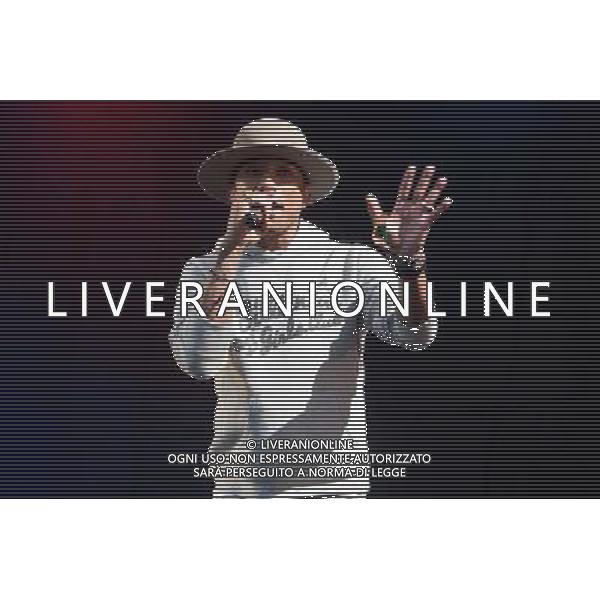 Pharrell Williams performs on the main stage at T in the Park Festival, Balado, Scotland UK on 12th July 2014 ©PHOTOSHOT/AGENZIA ALDO LIVERANI SAS - ITALY ONLY - EDITORIAL USE ONLY
