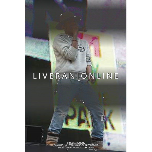 Pharrell Williams performs on the main stage at T in the Park Festival, Balado, Scotland UK on 12th July 2014 ©PHOTOSHOT/AGENZIA ALDO LIVERANI SAS - ITALY ONLY - EDITORIAL USE ONLY