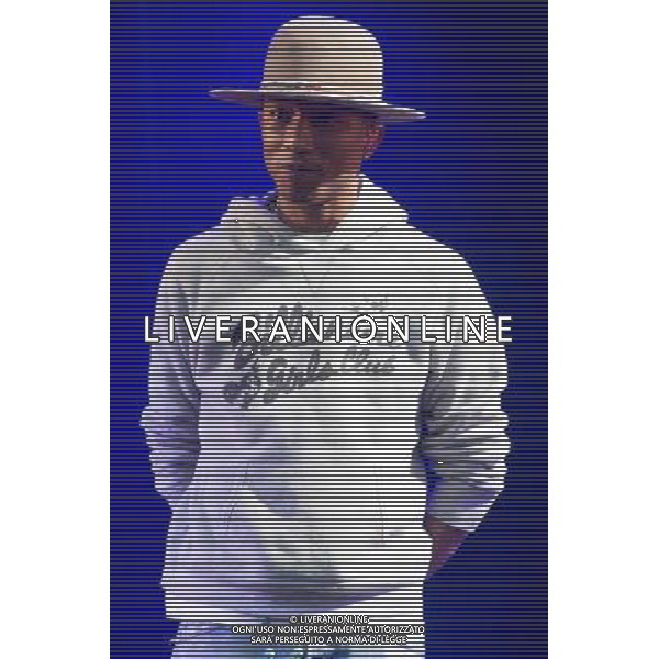 Pharrell Williams performs on the main stage at T in the Park Festival, Balado, Scotland UK on 12th July 2014 ©PHOTOSHOT/AGENZIA ALDO LIVERANI SAS - ITALY ONLY - EDITORIAL USE ONLY