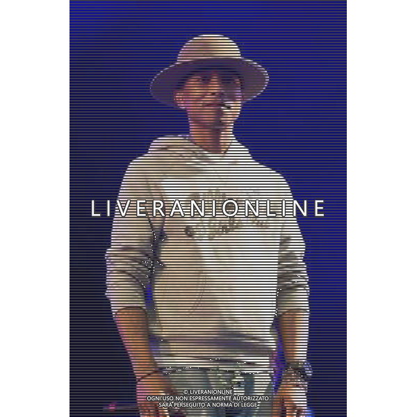 Pharrell Williams performs on the main stage at T in the Park Festival, Balado, Scotland UK on 12th July 2014 ©PHOTOSHOT/AGENZIA ALDO LIVERANI SAS - ITALY ONLY - EDITORIAL USE ONLY