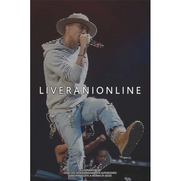 Pharrell Williams performs on the main stage at T in the Park Festival, Balado, Scotland UK on 12th July 2014 ©PHOTOSHOT/AGENZIA ALDO LIVERANI SAS - ITALY ONLY - EDITORIAL USE ONLY