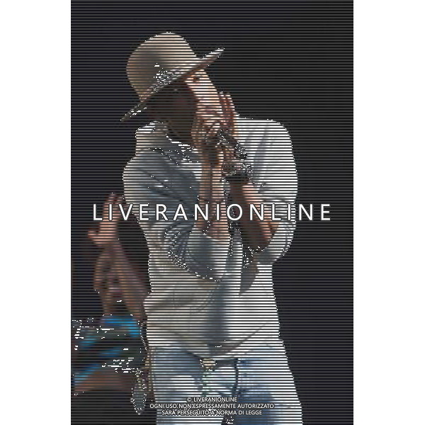 Pharrell Williams performs on the main stage at T in the Park Festival, Balado, Scotland UK on 12th July 2014 ©PHOTOSHOT/AGENZIA ALDO LIVERANI SAS - ITALY ONLY - EDITORIAL USE ONLY