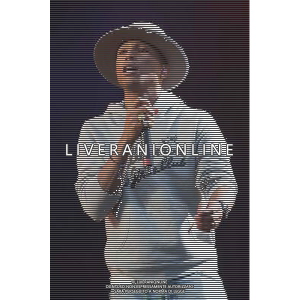 Pharrell Williams performs on the main stage at T in the Park Festival, Balado, Scotland UK on 12th July 2014 ©PHOTOSHOT/AGENZIA ALDO LIVERANI SAS - ITALY ONLY - EDITORIAL USE ONLY