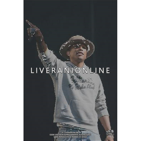 Pharrell Williams performs on the main stage at T in the Park Festival, Balado, Scotland UK on 12th July 2014 ©PHOTOSHOT/AGENZIA ALDO LIVERANI SAS - ITALY ONLY - EDITORIAL USE ONLY