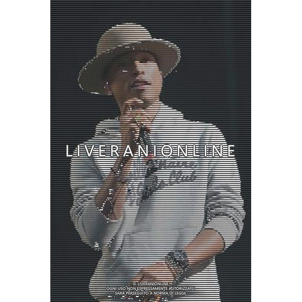 Pharrell Williams performs on the main stage at T in the Park Festival, Balado, Scotland UK on 12th July 2014 ©PHOTOSHOT/AGENZIA ALDO LIVERANI SAS - ITALY ONLY - EDITORIAL USE ONLY