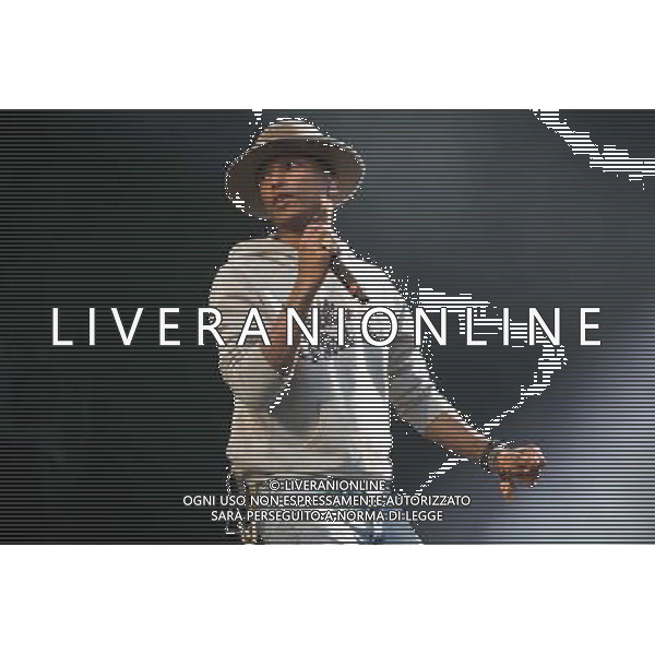 Pharrell Williams performs on the main stage at T in the Park Festival, Balado, Scotland UK on 12th July 2014 ©PHOTOSHOT/AGENZIA ALDO LIVERANI SAS - ITALY ONLY - EDITORIAL USE ONLY