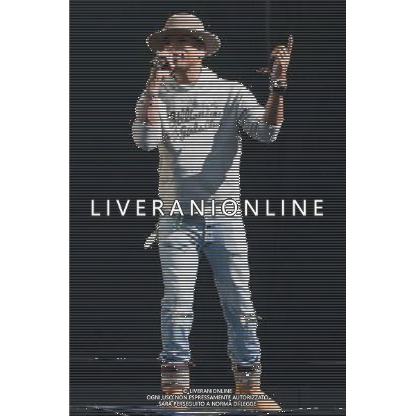Pharrell Williams performs on the main stage at T in the Park Festival, Balado, Scotland UK on 12th July 2014 ©PHOTOSHOT/AGENZIA ALDO LIVERANI SAS - ITALY ONLY - EDITORIAL USE ONLY