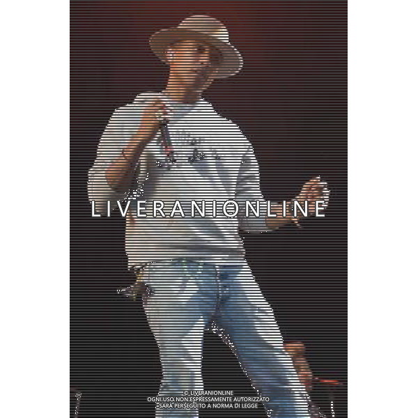 Pharrell Williams performs on the main stage at T in the Park Festival, Balado, Scotland UK on 12th July 2014 ©PHOTOSHOT/AGENZIA ALDO LIVERANI SAS - ITALY ONLY - EDITORIAL USE ONLY