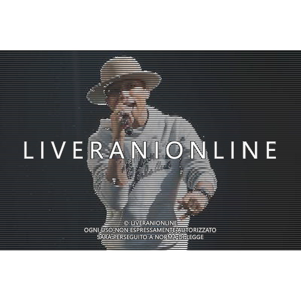 Pharrell Williams performs on the main stage at T in the Park Festival, Balado, Scotland UK on 12th July 2014 ©PHOTOSHOT/AGENZIA ALDO LIVERANI SAS - ITALY ONLY - EDITORIAL USE ONLY