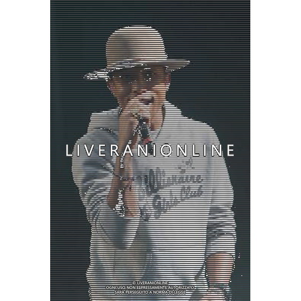 Pharrell Williams performs on the main stage at T in the Park Festival, Balado, Scotland UK on 12th July 2014 ©PHOTOSHOT/AGENZIA ALDO LIVERANI SAS - ITALY ONLY - EDITORIAL USE ONLY
