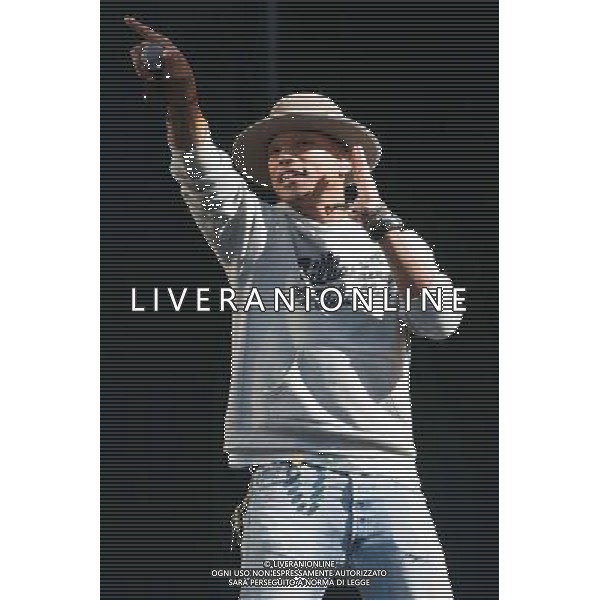 Pharrell Williams performs on the main stage at T in the Park Festival, Balado, Scotland UK on 12th July 2014 ©PHOTOSHOT/AGENZIA ALDO LIVERANI SAS - ITALY ONLY - EDITORIAL USE ONLY
