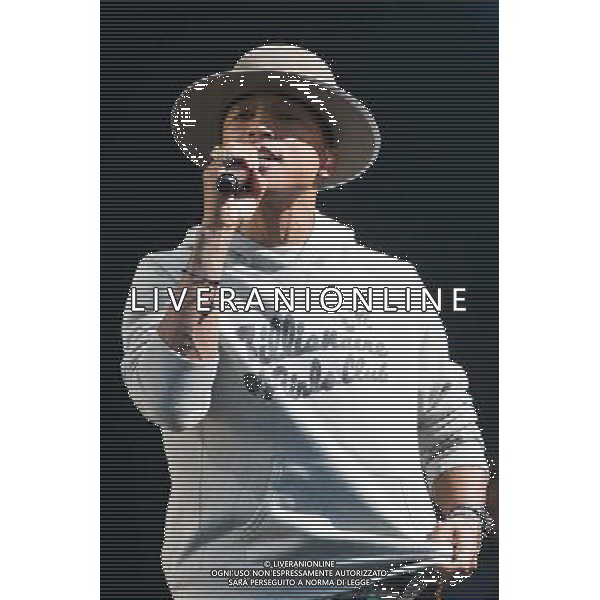Pharrell Williams performs on the main stage at T in the Park Festival, Balado, Scotland UK on 12th July 2014 ©PHOTOSHOT/AGENZIA ALDO LIVERANI SAS - ITALY ONLY - EDITORIAL USE ONLY