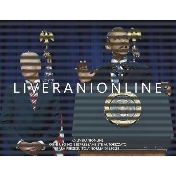(140722)--WASHINGTON D.C., July 22, 2014 ()-- U.S. President Barack Obama (R) speaks before he signes the Workforce Innovation and Opportunity Act at White House in Washington D.C., capital of the United States, July 22, 2014. U.S. President Barack Obama singed H.R.803, the Workforce Innovation and Opportunity Act, which reauthorizes and reforms core workforce development programs administered by the Departments of Education and Labor and transfers from the Department of Education to the Department of Health and Human Services certain disability and independent living program functions, on Tuesday. (/Bao Dandan) ©PHOTOSHOT/AGENZIA ALDO LIVERANI SAS - ITALY ONLY - EDITORIAL USE ONLY