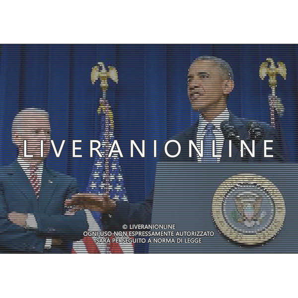 (140722)--WASHINGTON D.C., July 22, 2014 ()-- U.S. President Barack Obama (R) speaks before he signes the Workforce Innovation and Opportunity Act at White House in Washington D.C., capital of the United States, July 22, 2014. U.S. President Barack Obama singed H.R.803, the Workforce Innovation and Opportunity Act, which reauthorizes and reforms core workforce development programs administered by the Departments of Education and Labor and transfers from the Department of Education to the Department of Health and Human Services certain disability and independent living program functions, on Tuesday. (/Bao Dandan) ©PHOTOSHOT/AGENZIA ALDO LIVERANI SAS - ITALY ONLY - EDITORIAL USE ONLY